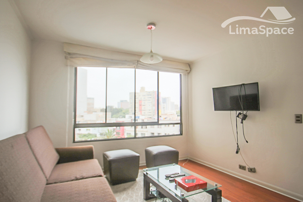 Céntrico departamento con áreas comunes